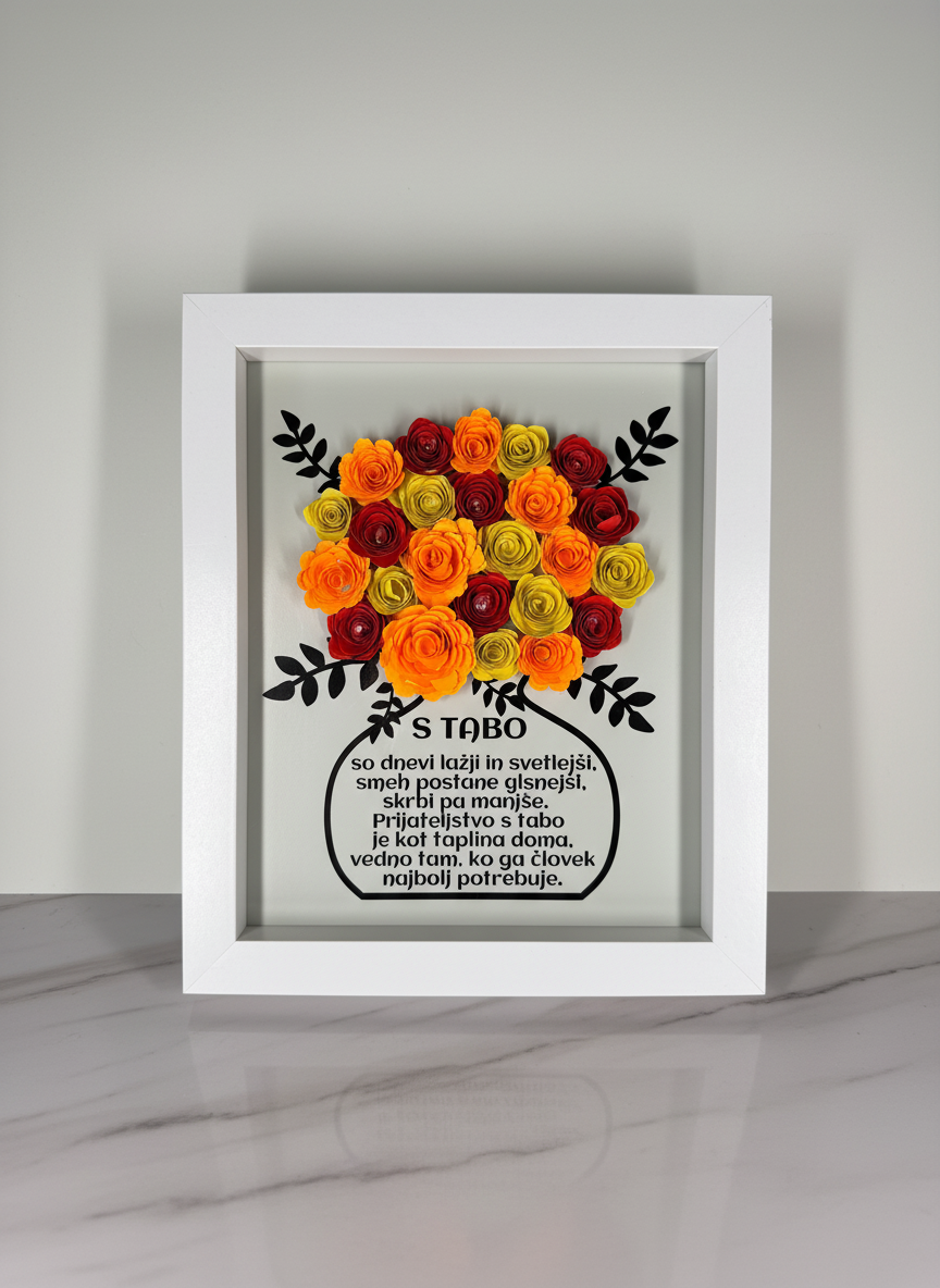 Okvir s papirnatimi rožicami in posvetilom